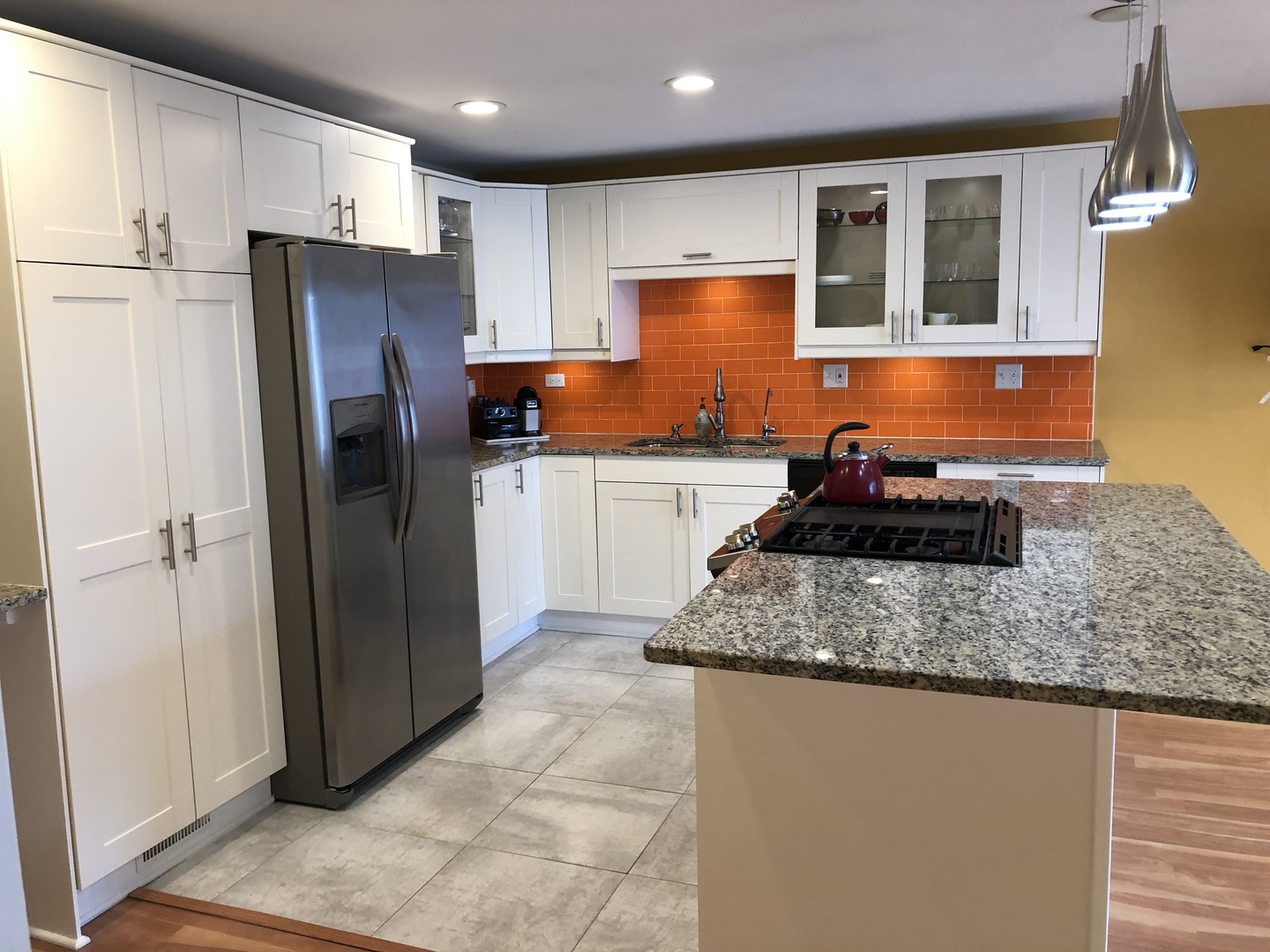 Undisclosed Address Schaumburg, IL 60193 - Photo 6 of 10 a kitchen with stainless steel appliances granite countertop a refrigerator a stove and a sink
