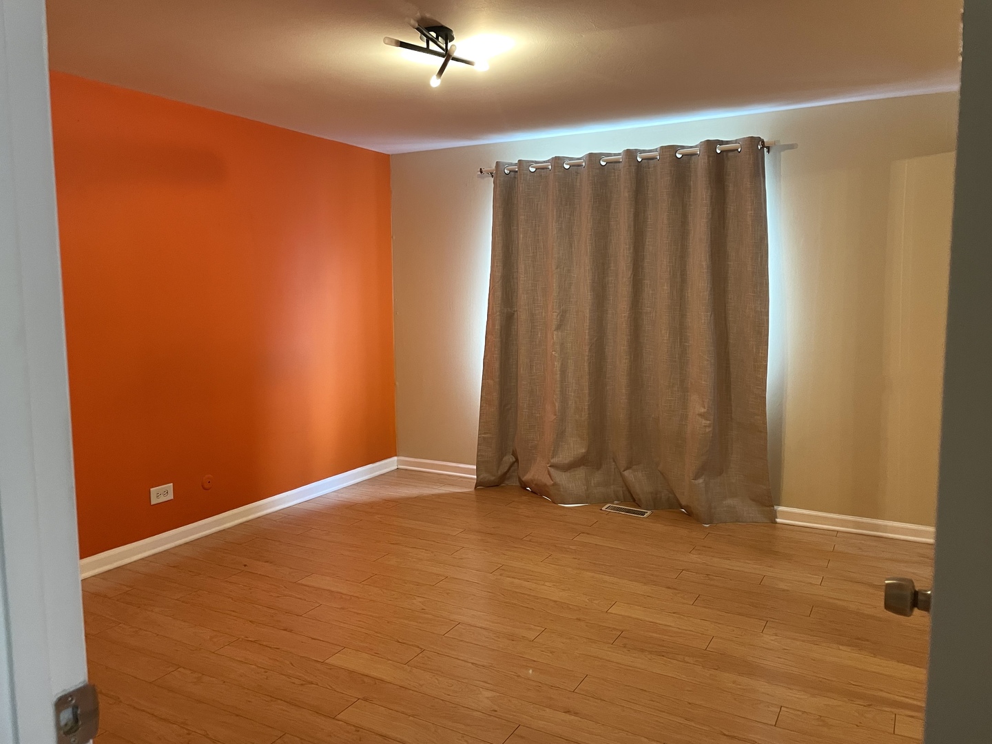 Undisclosed Address Schaumburg, IL 60193 - Photo 7 of 10 an empty room with a wooden door