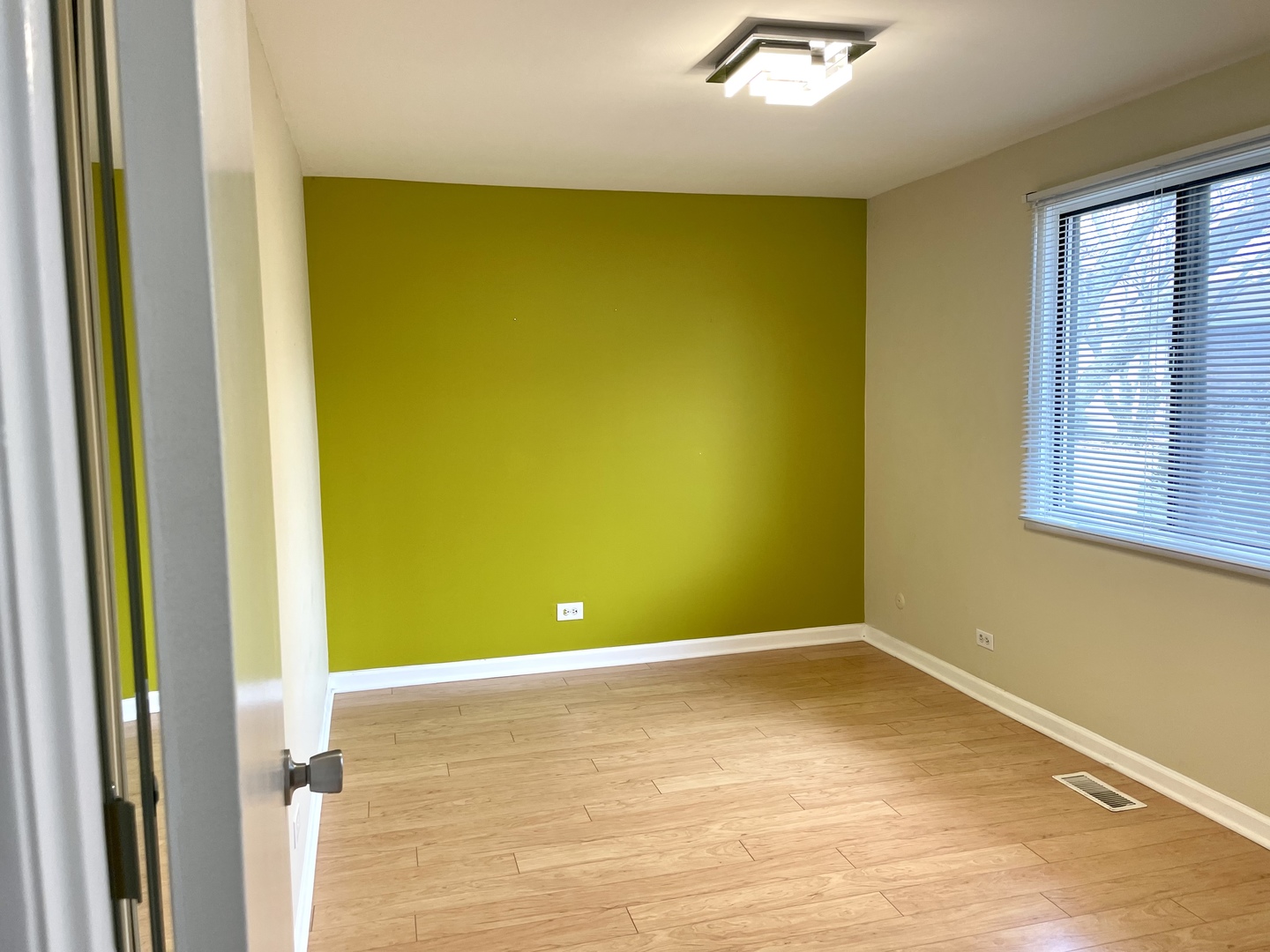 Undisclosed Address Schaumburg, IL 60193 - Photo 8 of 10 a view of a room with windows