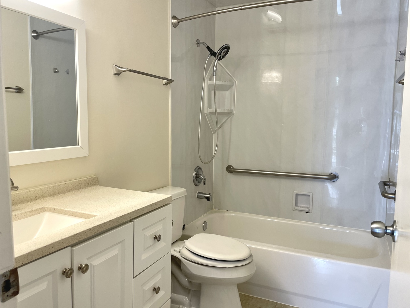 Undisclosed Address Schaumburg, IL 60193 - Photo 9 of 10 a bathroom with a sink a toilet and shower