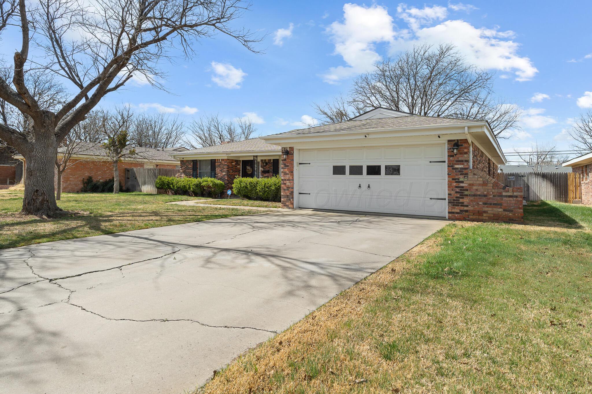 3424 Wayne Street Amarillo, TX 79109 - Photo 2 of 33 a front view of house with yard