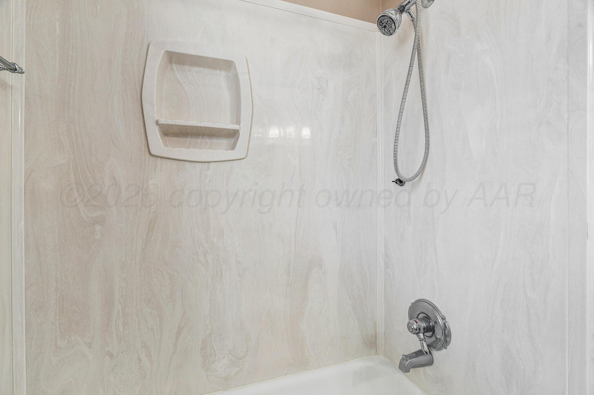 3424 Wayne Street Amarillo, TX 79109 - Photo 24 of 33 a bathroom with a shower