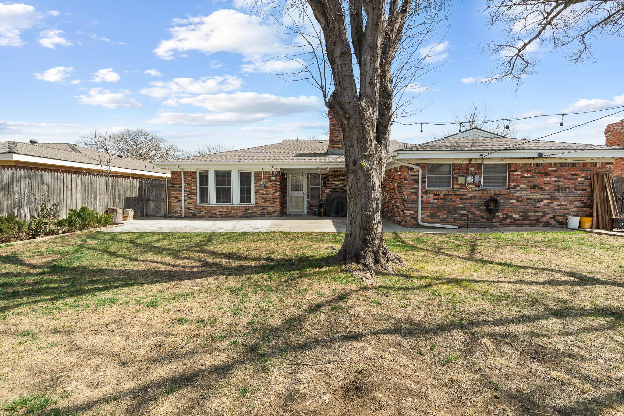 3424 Wayne Street Amarillo, TX 79109 - Photo 31 of 33 a view of a house with a yard