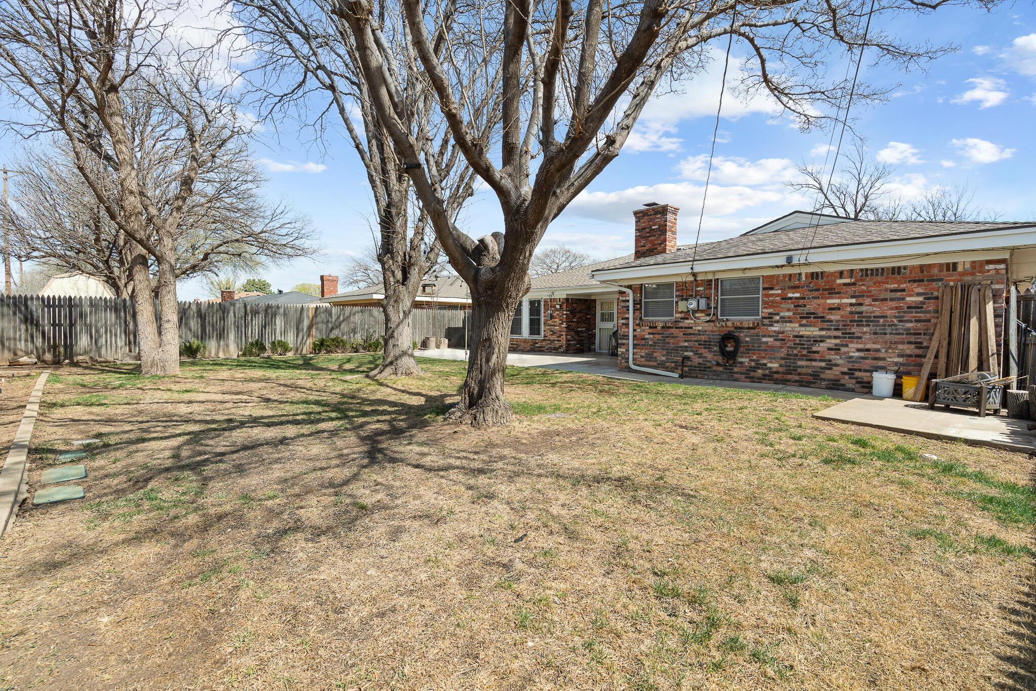 3424 Wayne Street Amarillo, TX 79109 - Photo 33 of 33 a view of a house with a yard