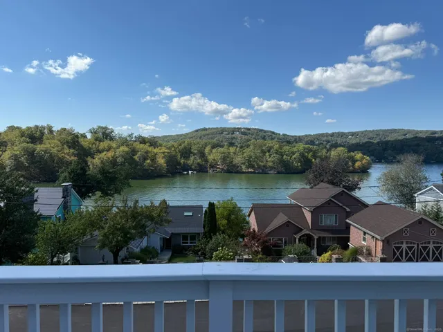 a view of a lake with a mountain in the background
