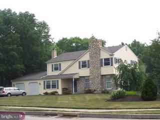 3001 Appledale Road Audubon, PA 19403 - Photo 1 of 5 a front view of a house with a garden