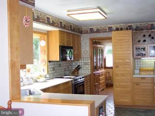 3001 Appledale Road Audubon, PA 19403 - Photo 2 of 5 a bathroom with a granite countertop sink and a large mirror