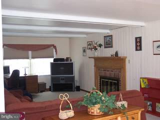 3001 Appledale Road Audubon, PA 19403 - Photo 3 of 5 a living room with furniture and a fireplace