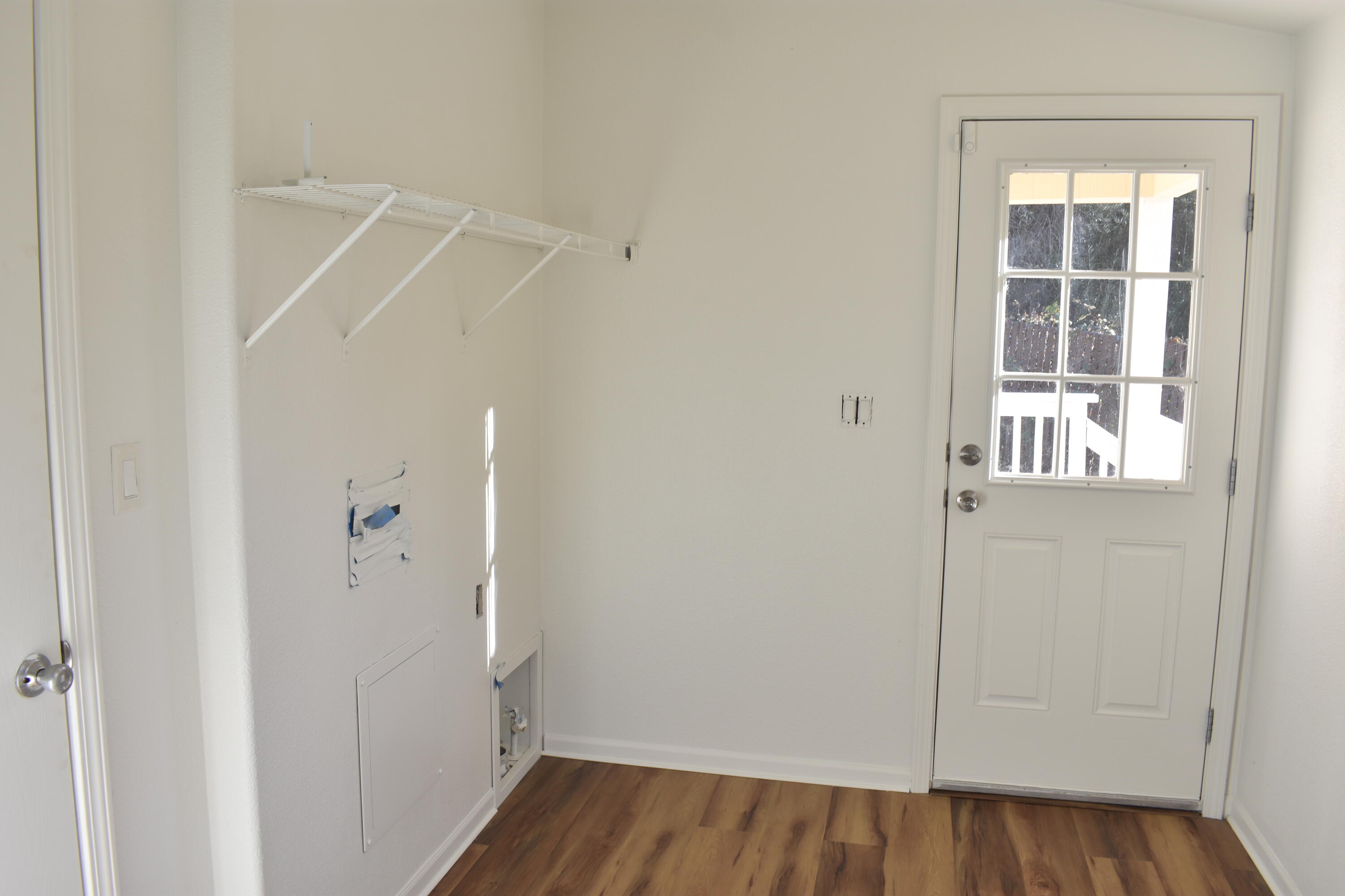 12125 Lake Boulevard Redding, CA 96003 - Photo 14 of 24 a view of an empty room with wooden floor and closet