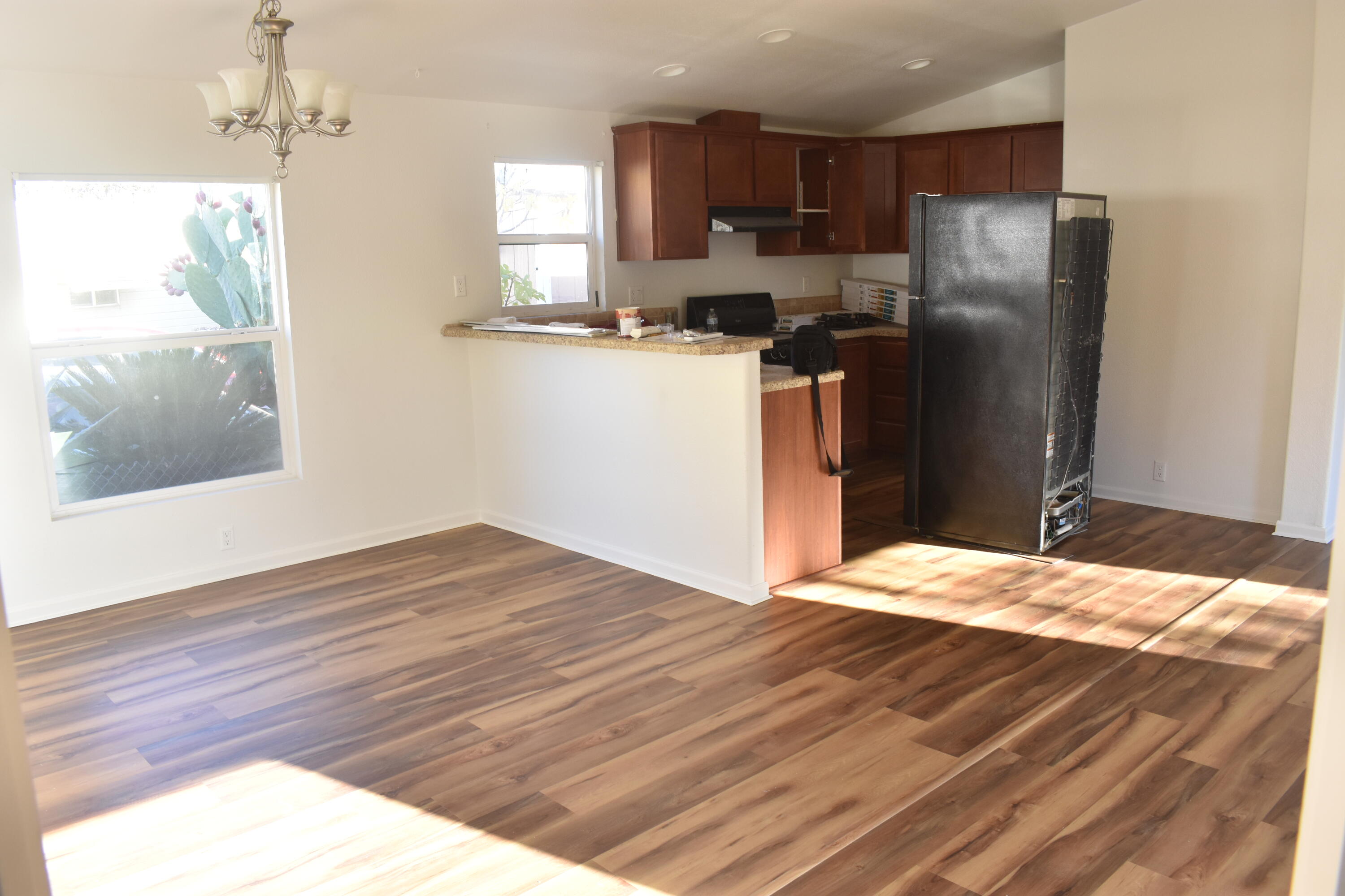 12125 Lake Boulevard Redding, CA 96003 - Photo 18 of 24 a bedroom with a bed and wooden floor