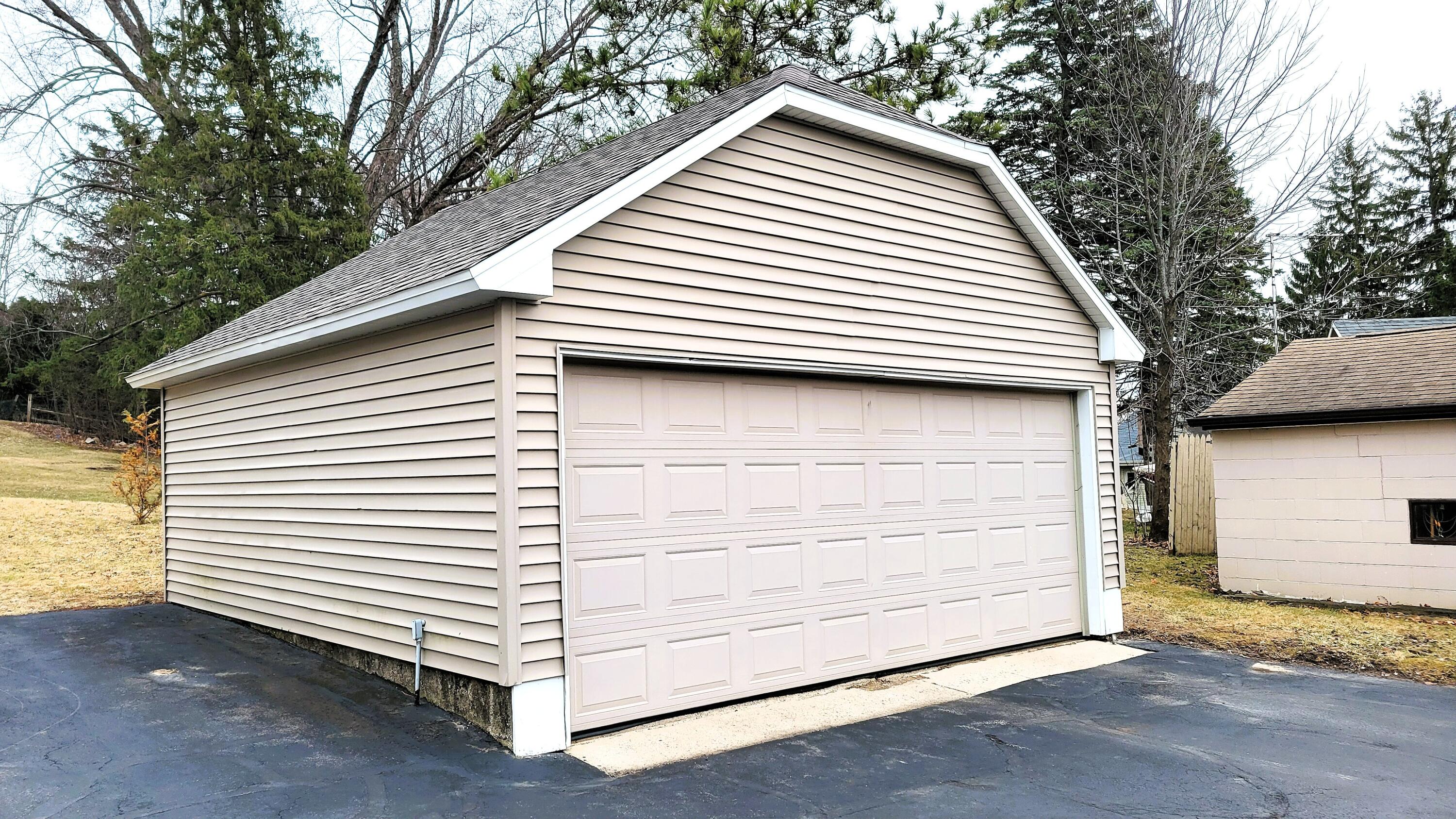 1909 Salisbury Road, Unit 1911 West Bend, WI 53090 - Photo 2 of 20 DETACHED garage