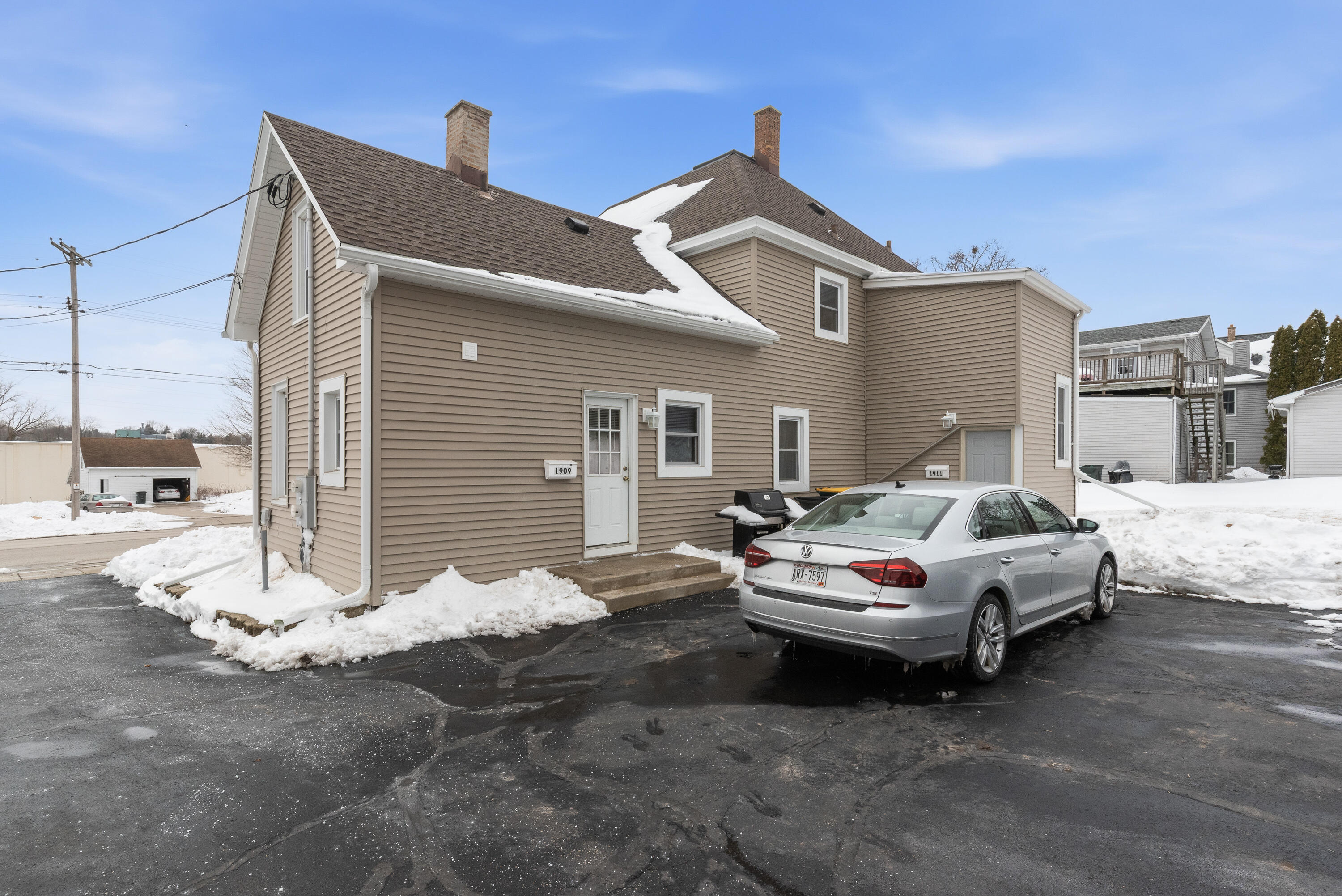 1909 Salisbury Road, Unit 1911 West Bend, WI 53090 - Photo 3 of 20 BACK entrace to upper on right