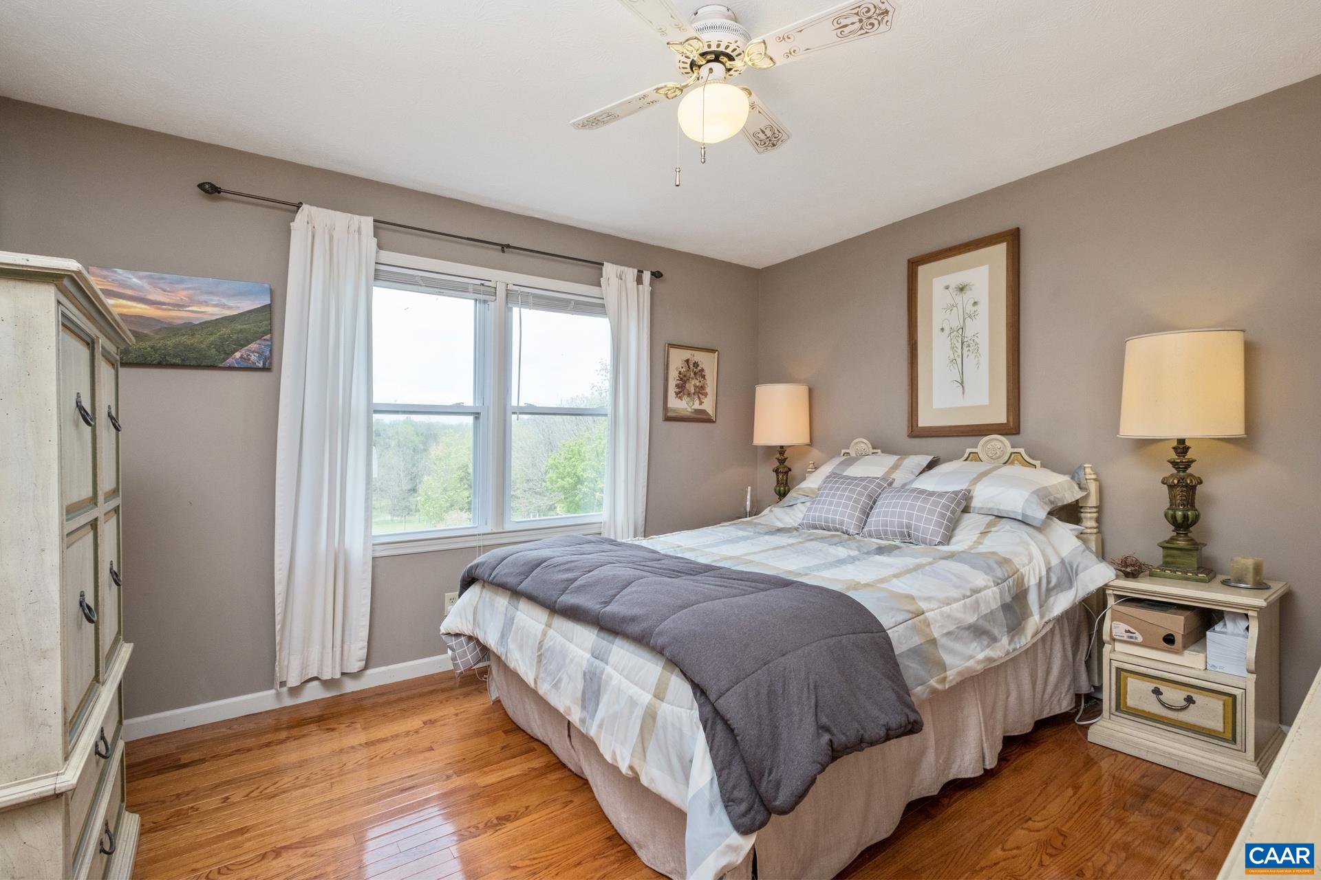349 Todd Road Mount Sidney, VA 24467 - Photo 20 of 43 a bedroom with a bed and a chandelier