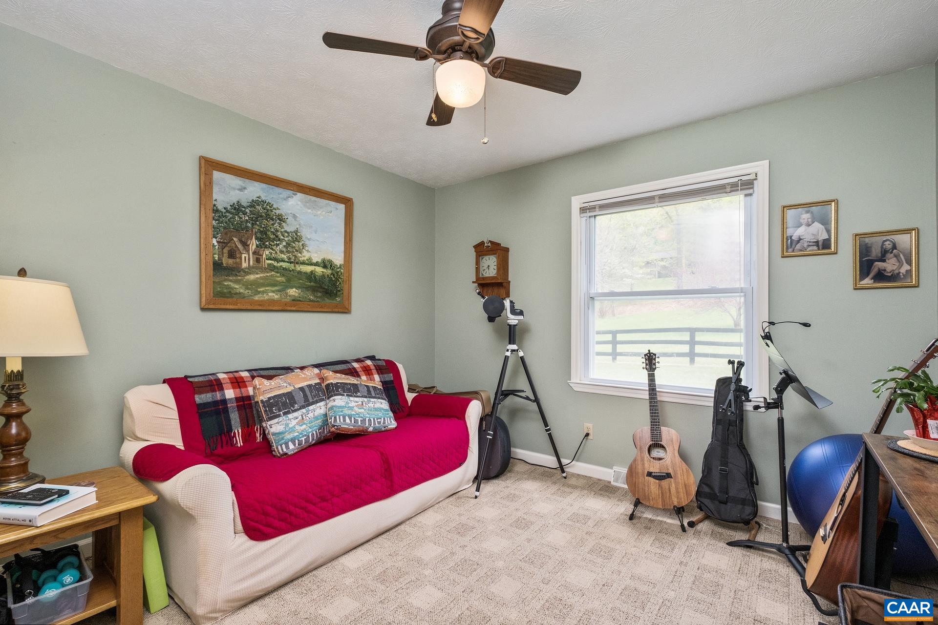 349 Todd Road Mount Sidney, VA 24467 - Photo 24 of 43 a living room with furniture and a window