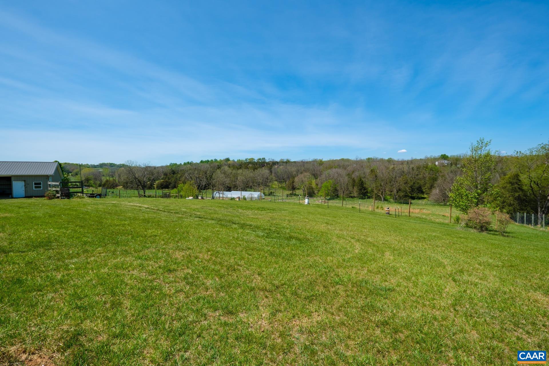 349 Todd Road Mount Sidney, VA 24467 - Photo 34 of 43 a view of a green field with wooden fence