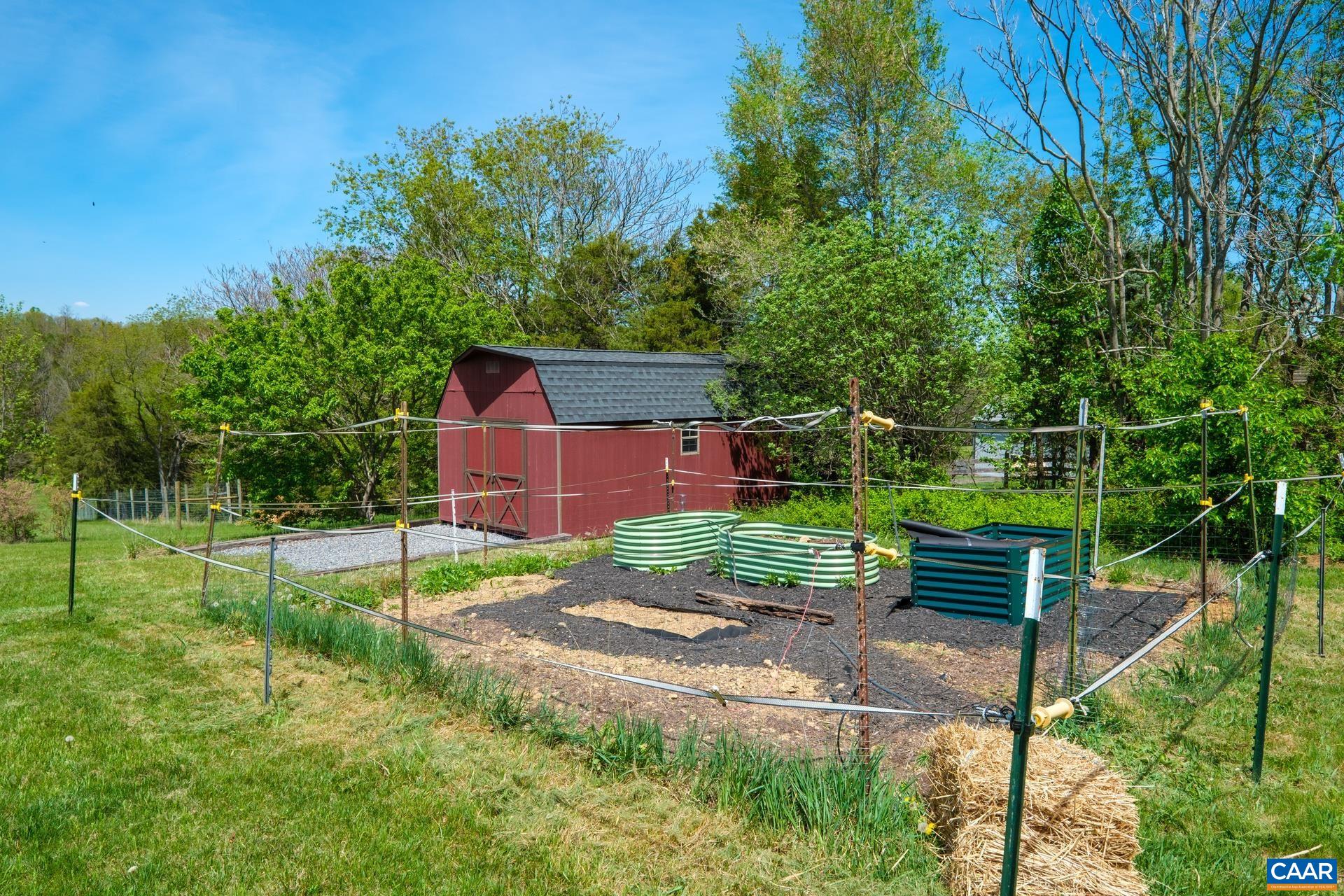 349 Todd Road Mount Sidney, VA 24467 - Photo 35 of 43 a view of a backyard with a wooden fence