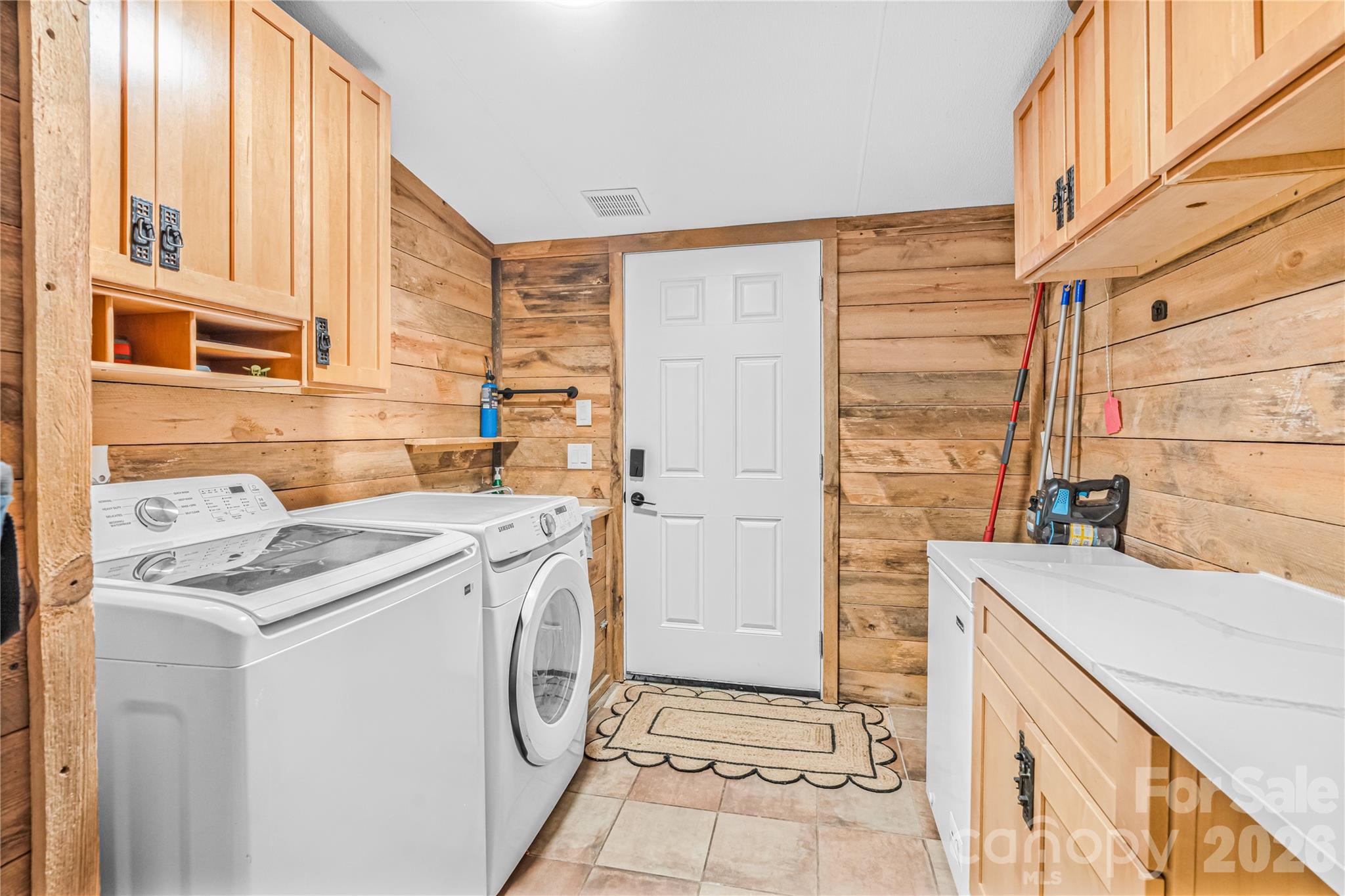 2235 Sandy Ridge Church Road Morven, NC 28119 - Photo 17 of 38 a utility room with dryer and washer