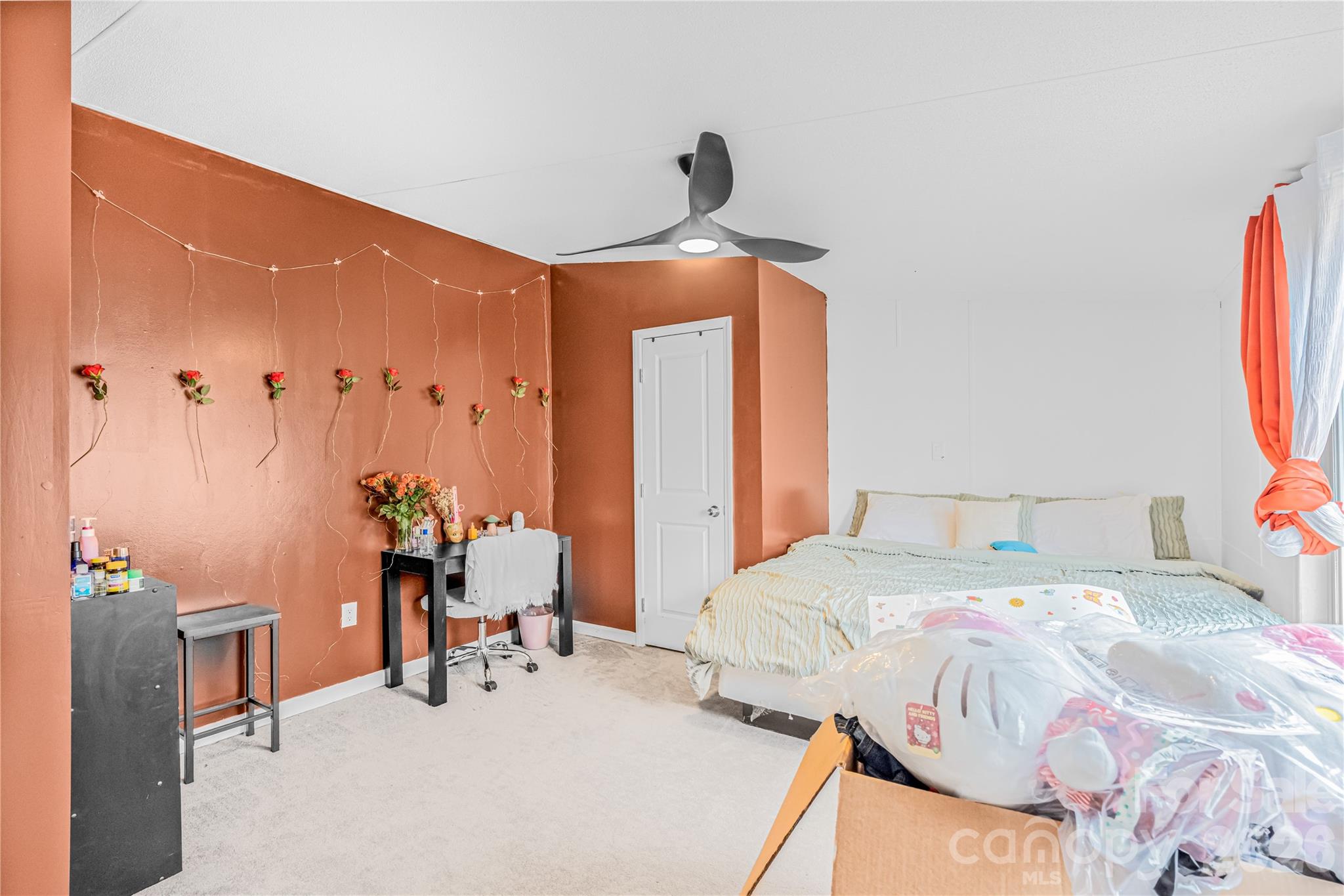 2235 Sandy Ridge Church Road Morven, NC 28119 - Photo 19 of 38 a bedroom with a bed and a table in it