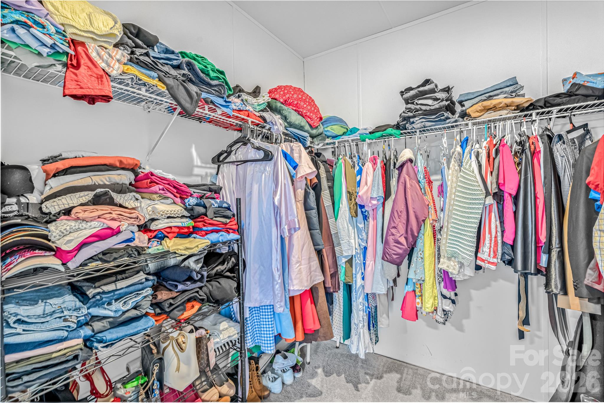 2235 Sandy Ridge Church Road Morven, NC 28119 - Photo 24 of 38 a view of walk in closet with clothes