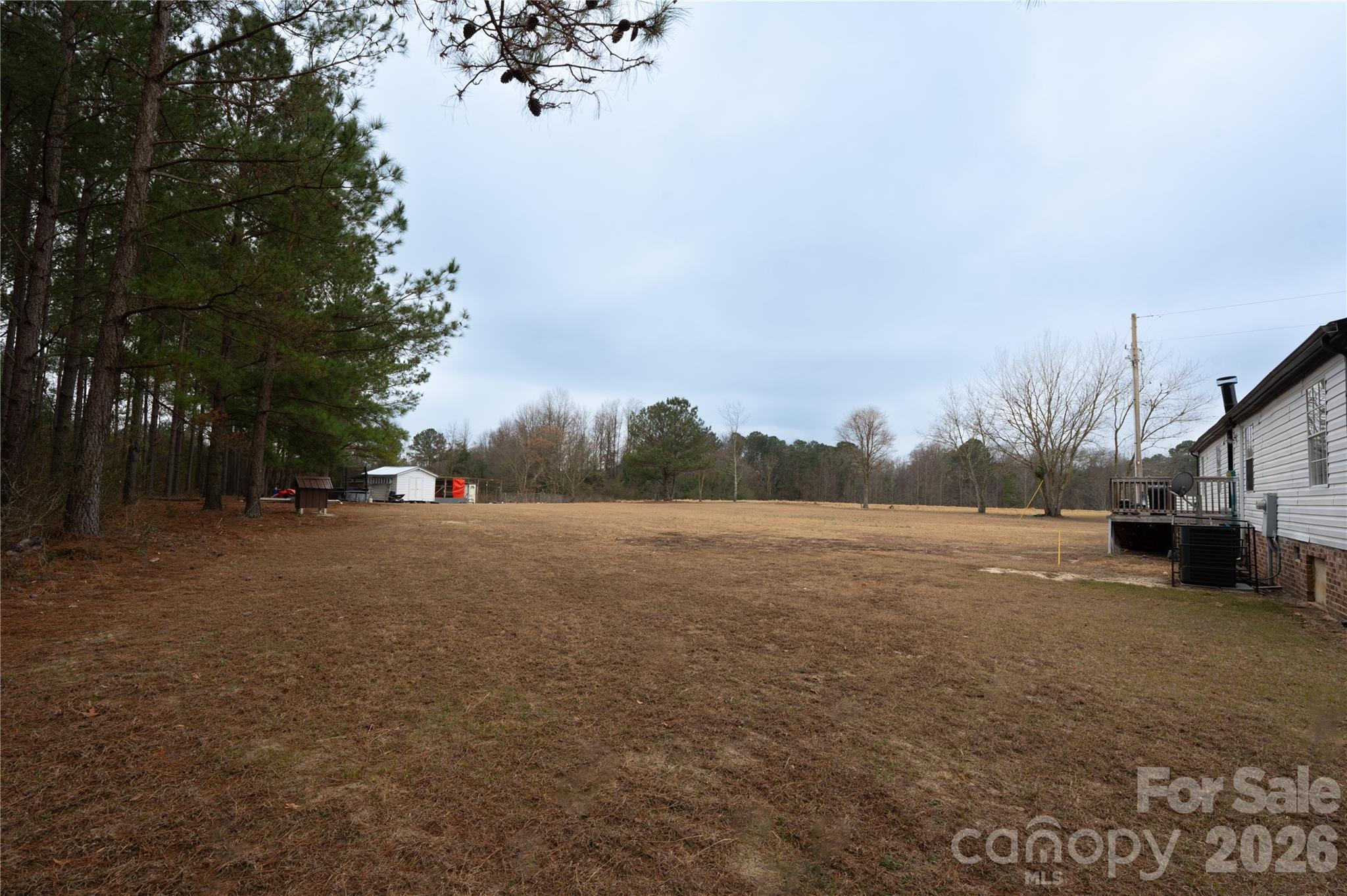 2235 Sandy Ridge Church Road Morven, NC 28119 - Photo 35 of 38 a view of dirt road with a building in the background