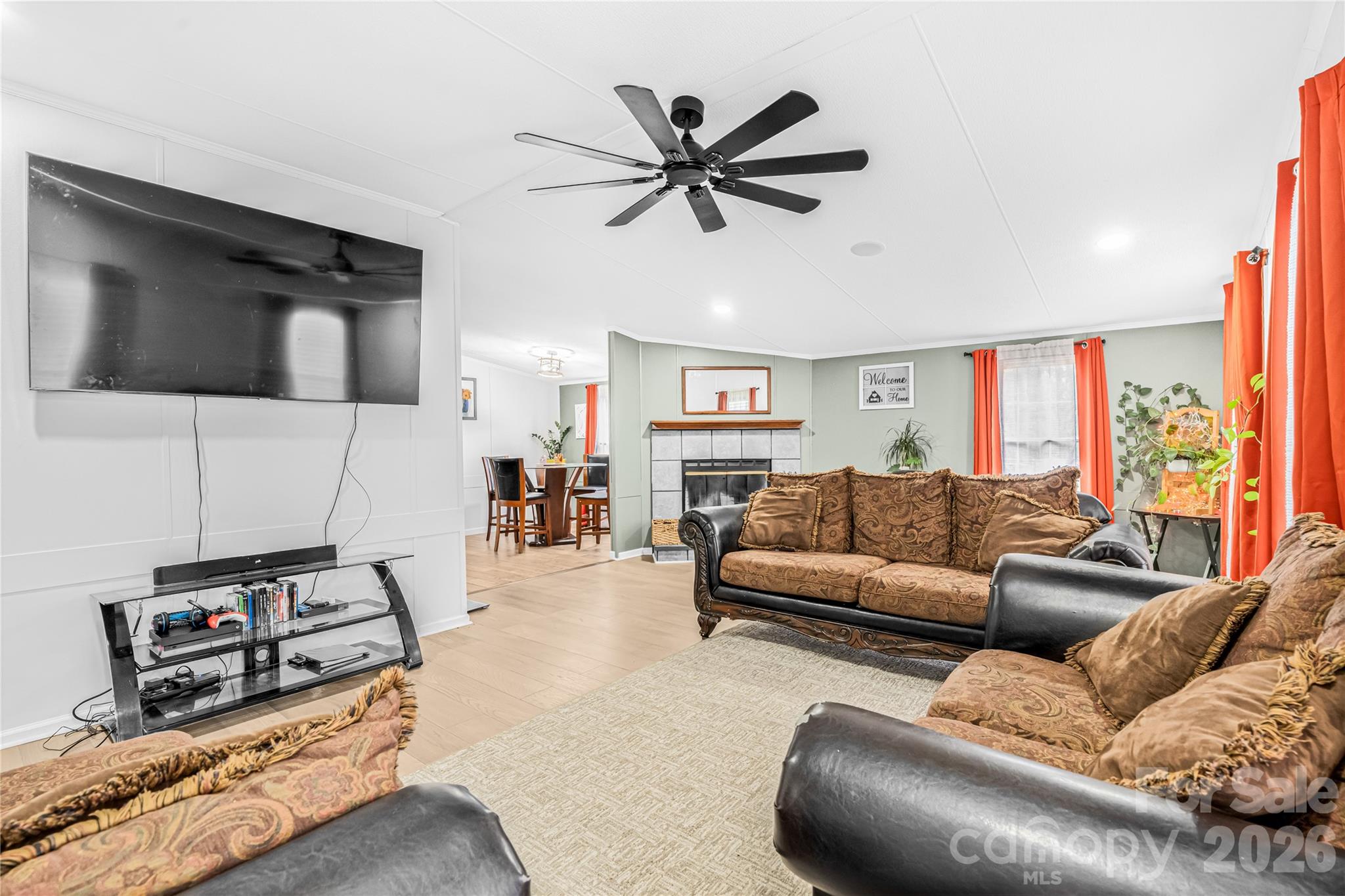 2235 Sandy Ridge Church Road Morven, NC 28119 - Photo 10 of 38 a living room with furniture and a flat screen tv