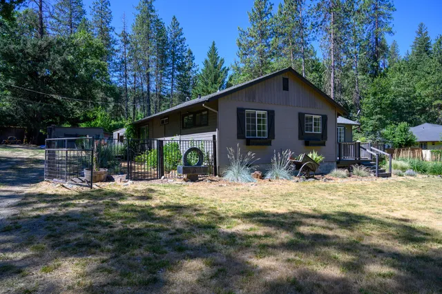 a view of a chairs and table in a patio