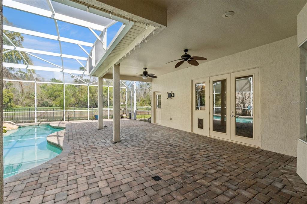 2541 Teton Stone Run Orlando, FL 32828 - Photo 51 of 82 a view of empty room with wooden floor