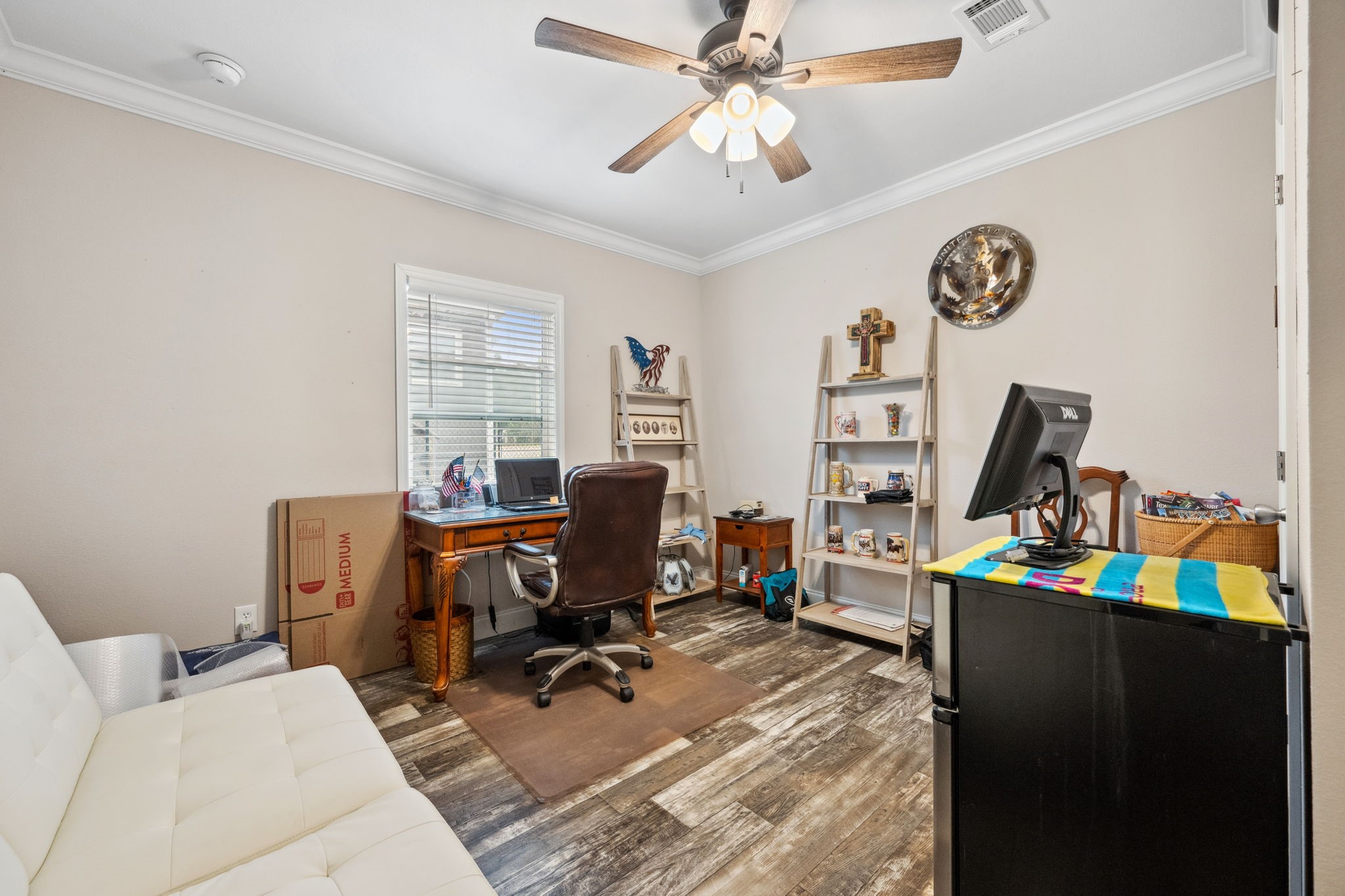 730 Coco Loop Point Blank, TX 77364 - Photo 17 of 42 a view of a workspace with furniture and a window