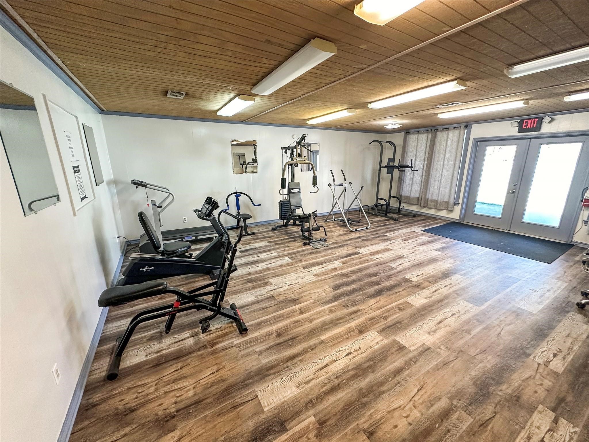 730 Coco Loop Point Blank, TX 77364 - Photo 31 of 42 a view of a room with gym equipment