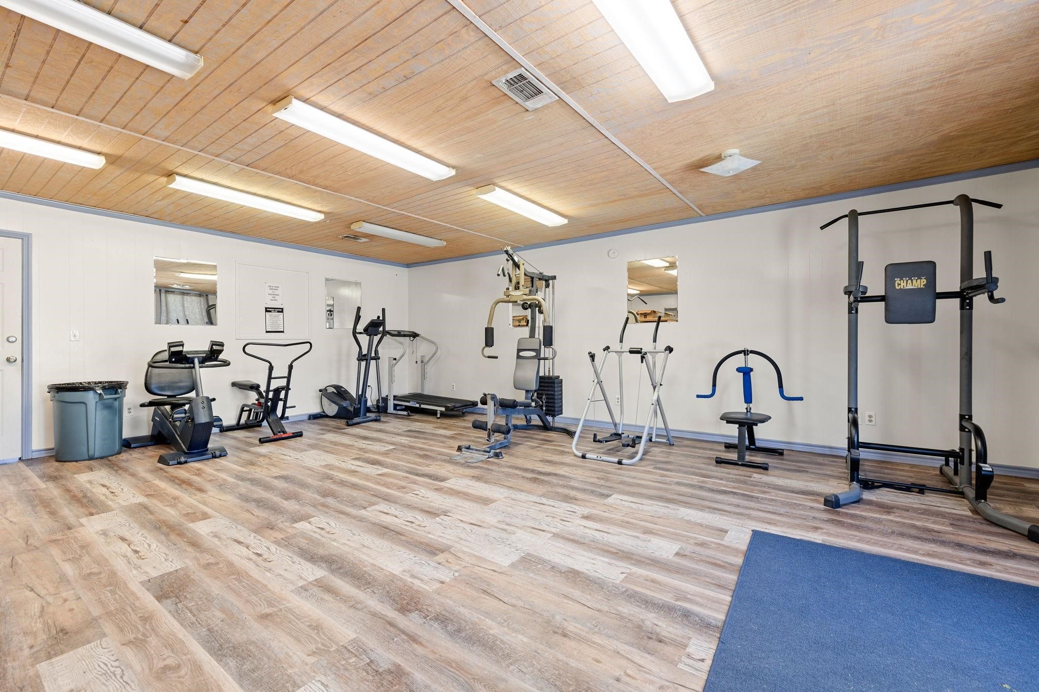 730 Coco Loop Point Blank, TX 77364 - Photo 32 of 42 a view of a room with gym equipment
