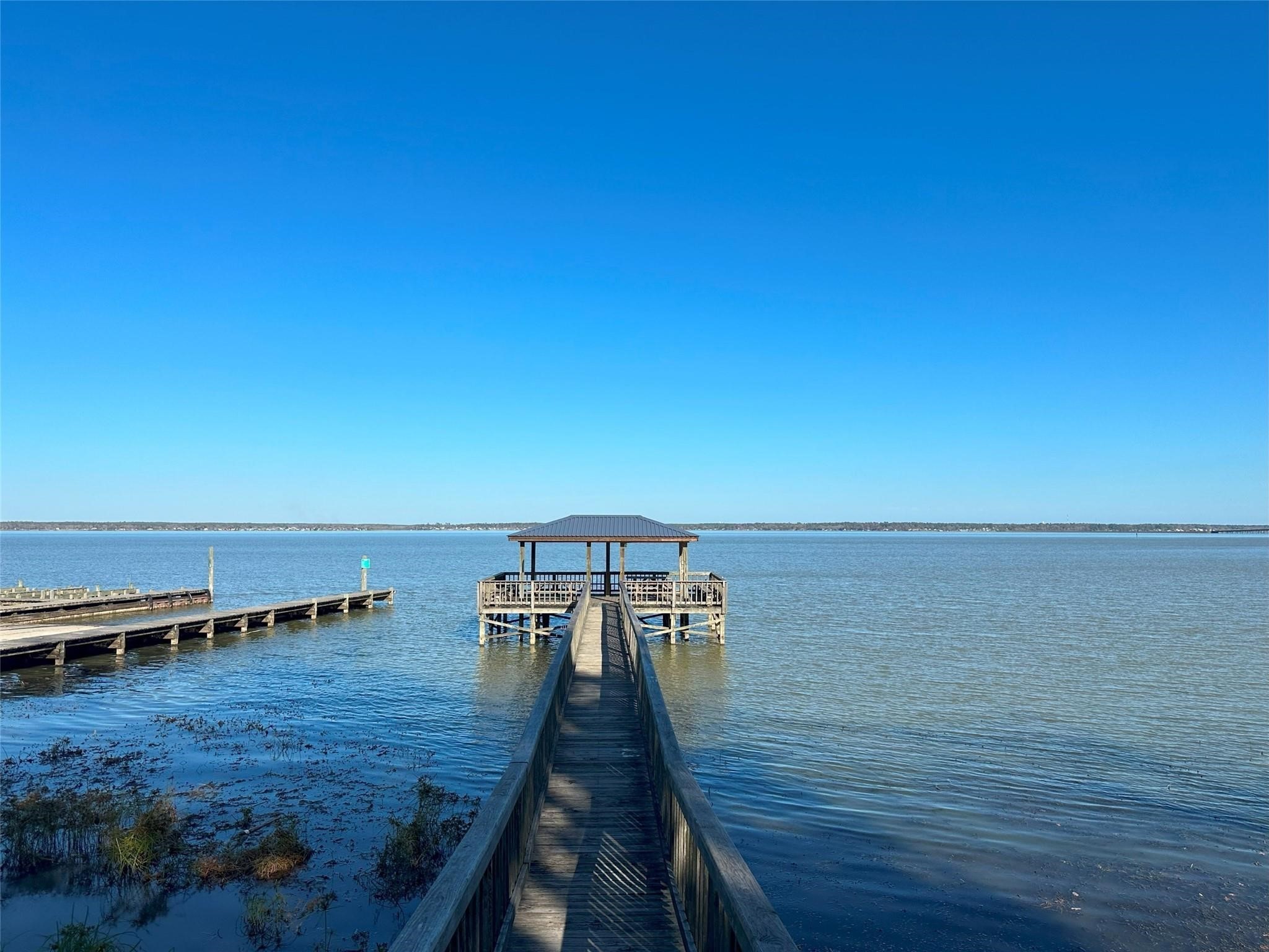 730 Coco Loop Point Blank, TX 77364 - Photo 34 of 42 a view of a balcony with an ocean