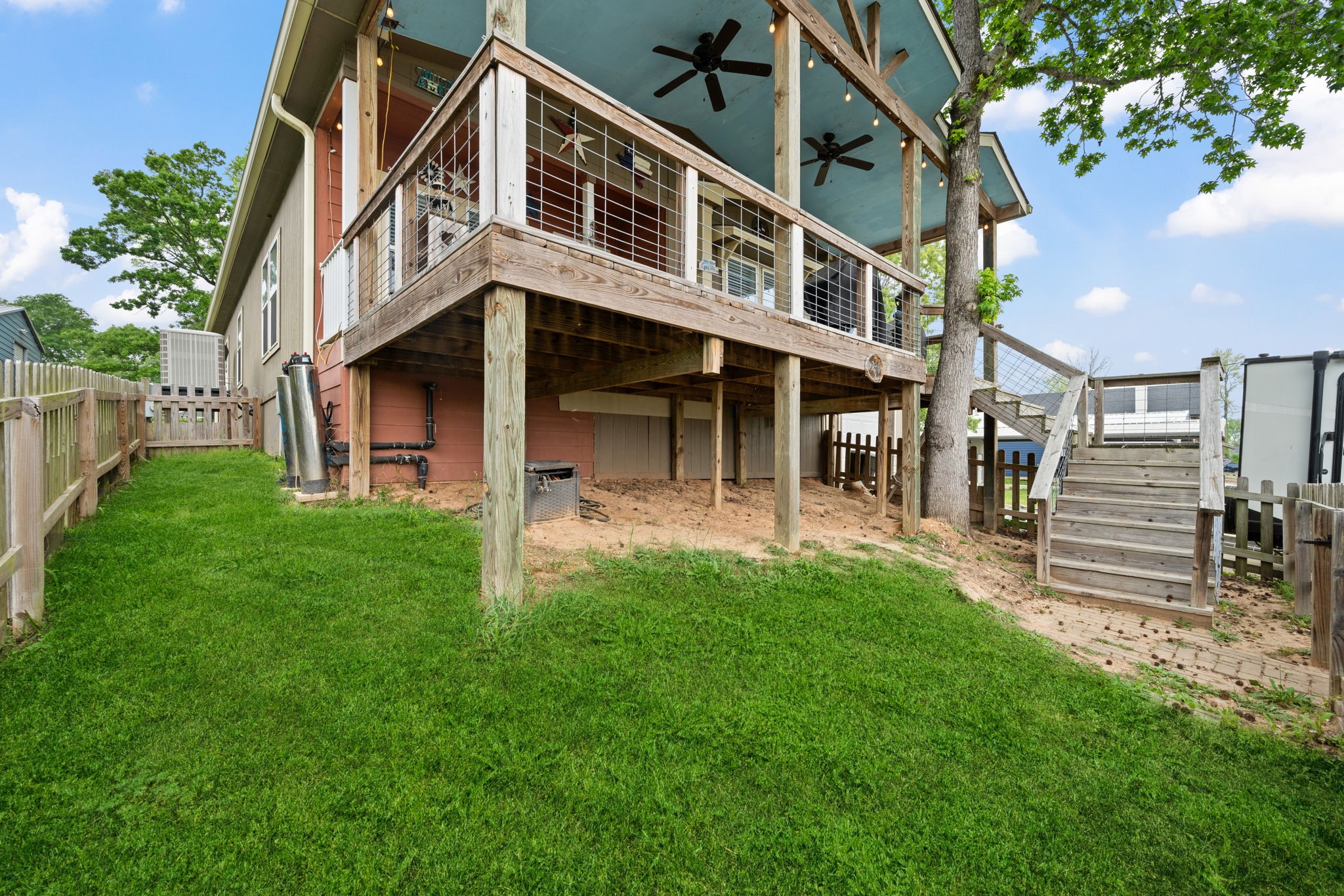 730 Coco Loop Point Blank, TX 77364 - Photo 6 of 42 a view of a house with a yard
