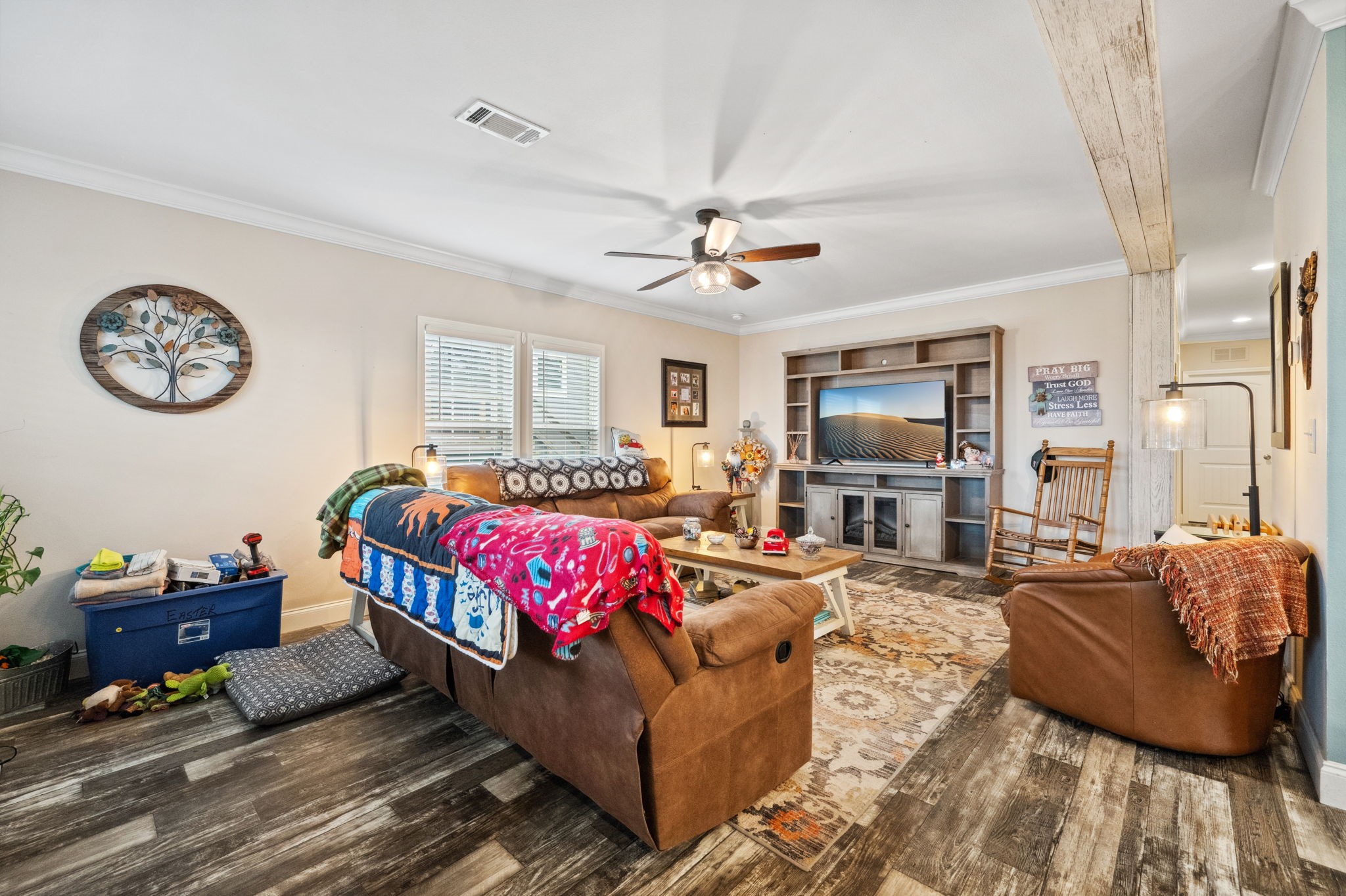 730 Coco Loop Point Blank, TX 77364 - Photo 7 of 42 a spacious bedroom with a bed a couch and dresser