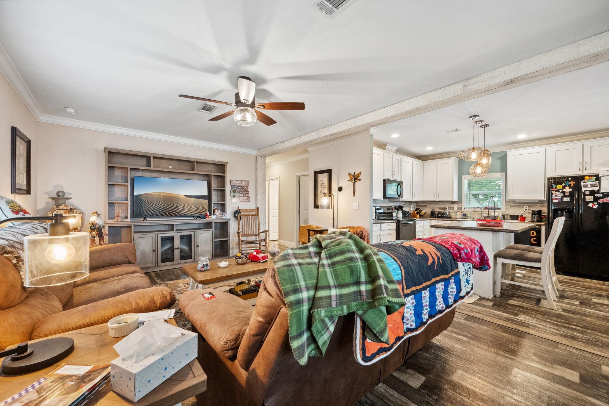 730 Coco Loop Point Blank, TX 77364 - Photo 8 of 42 a living room with furniture and a flat screen tv