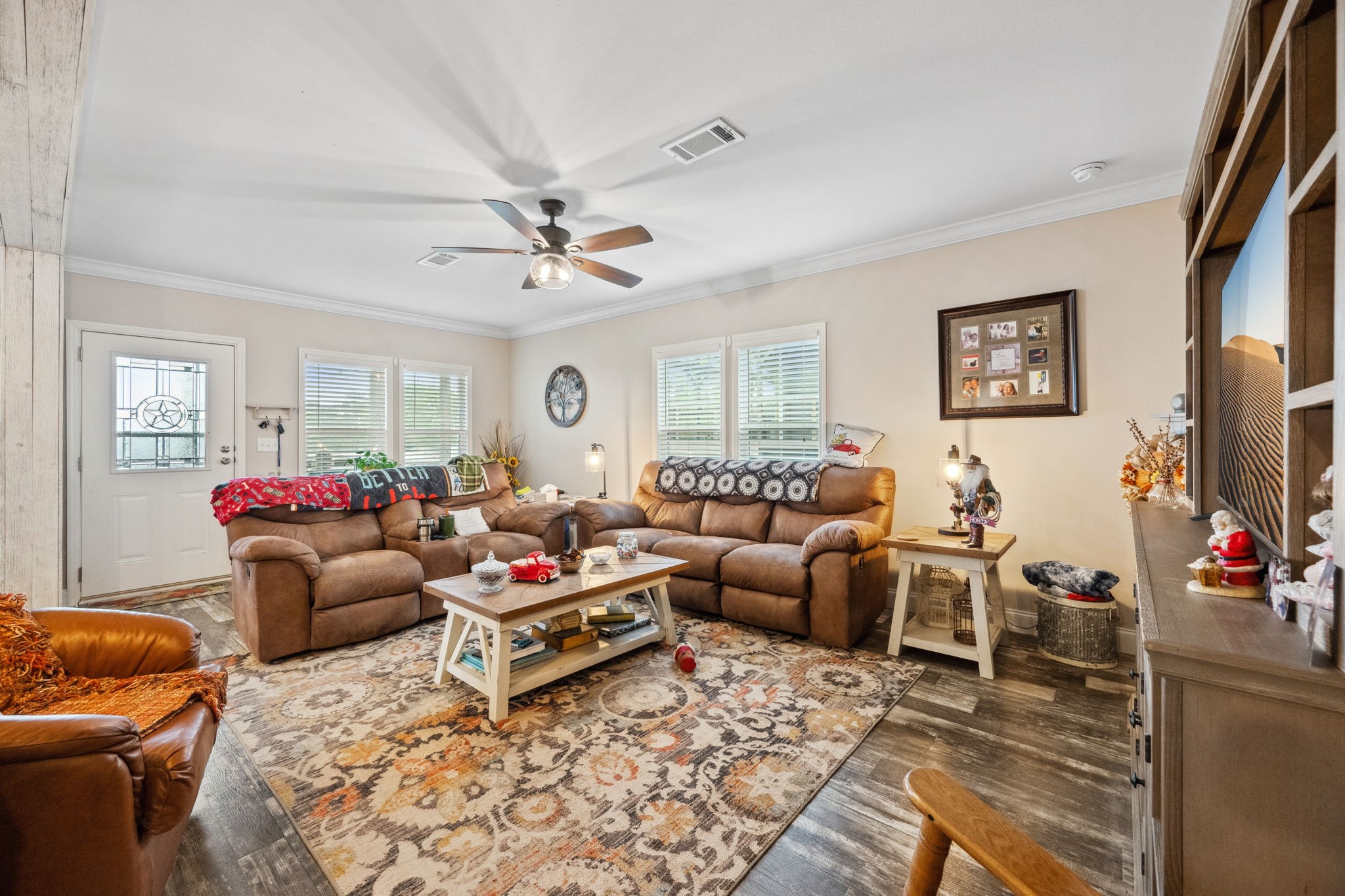 730 Coco Loop Point Blank, TX 77364 - Photo 9 of 42 a living room with furniture and a flat screen tv