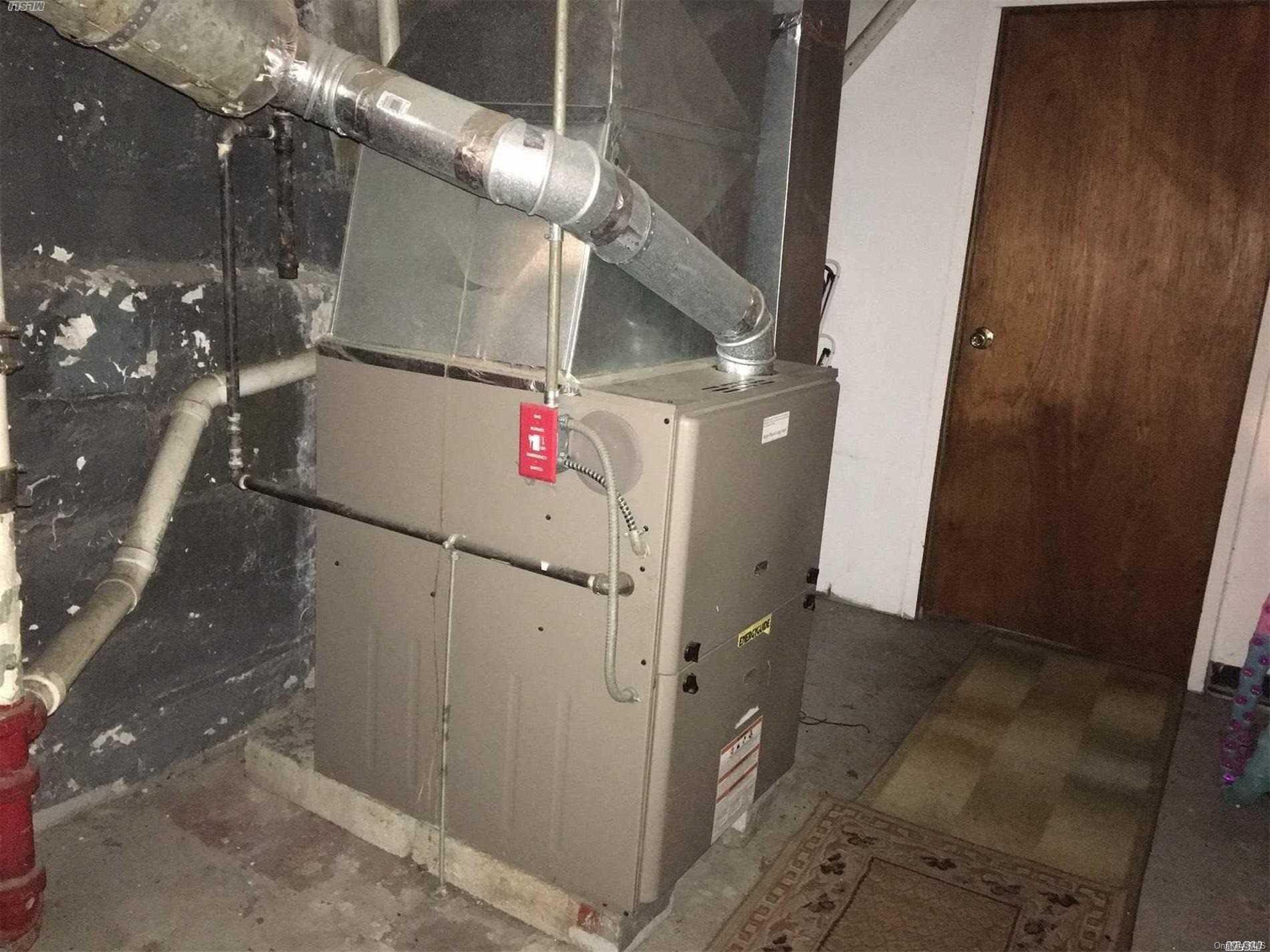60-13 59th Road Queens, NY 11378 - Photo 20 of 20 a view of water heater room