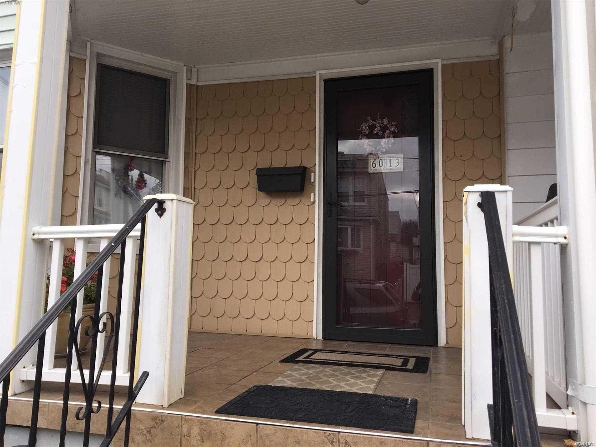 60-13 59th Road Queens, NY 11378 - Photo 3 of 20 a view of front door