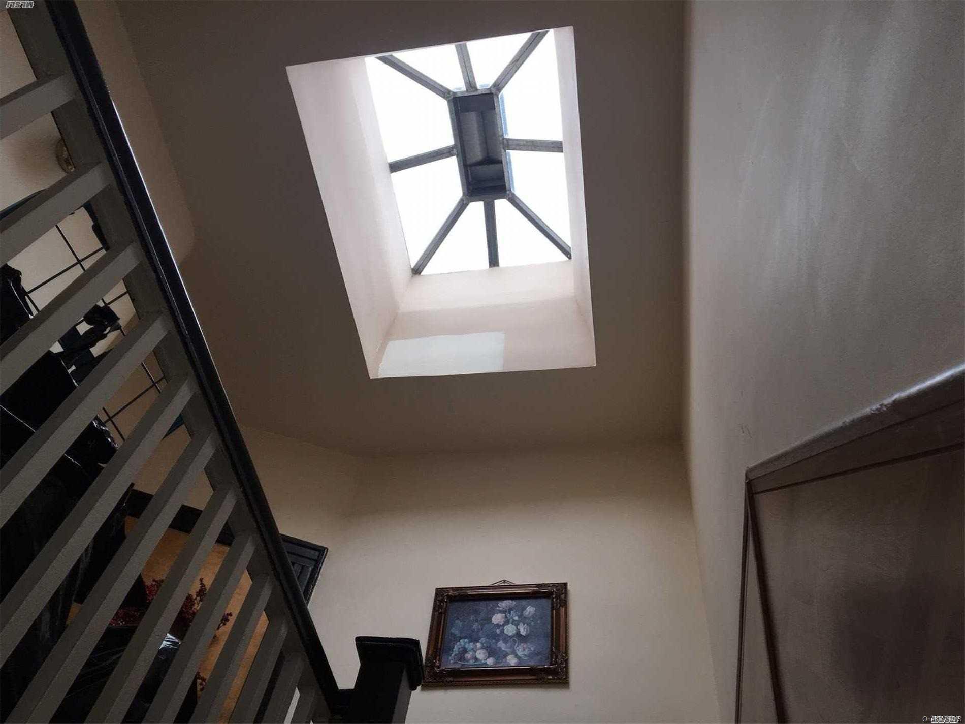60-13 59th Road Queens, NY 11378 - Photo 9 of 20 a view of an entryway