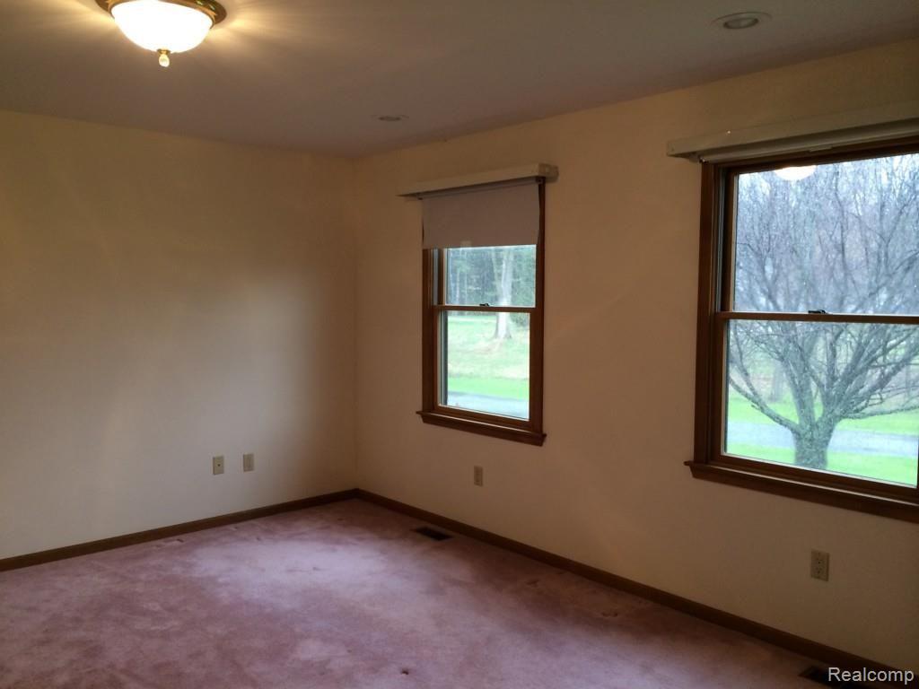 9281 North Gregory Road Fowlerville, MI 48836 - Photo 12 of 17 Master Bedroom with a view.