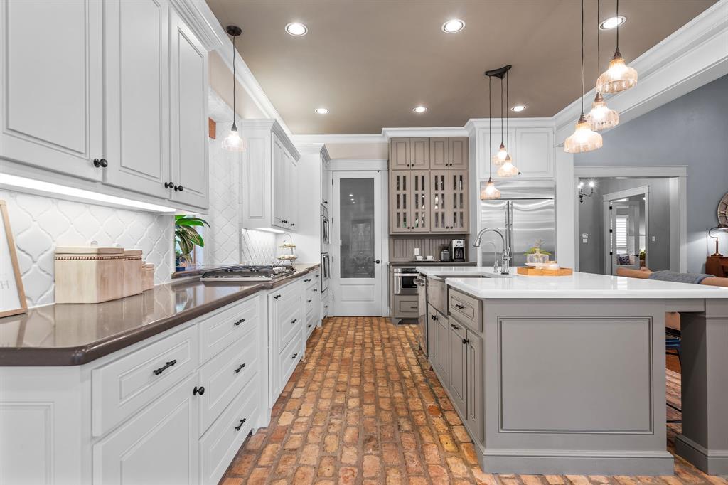 3328 Clubview Drive Denton, TX 76226 - Photo 8 of 40 Oversized island with additional prep space!