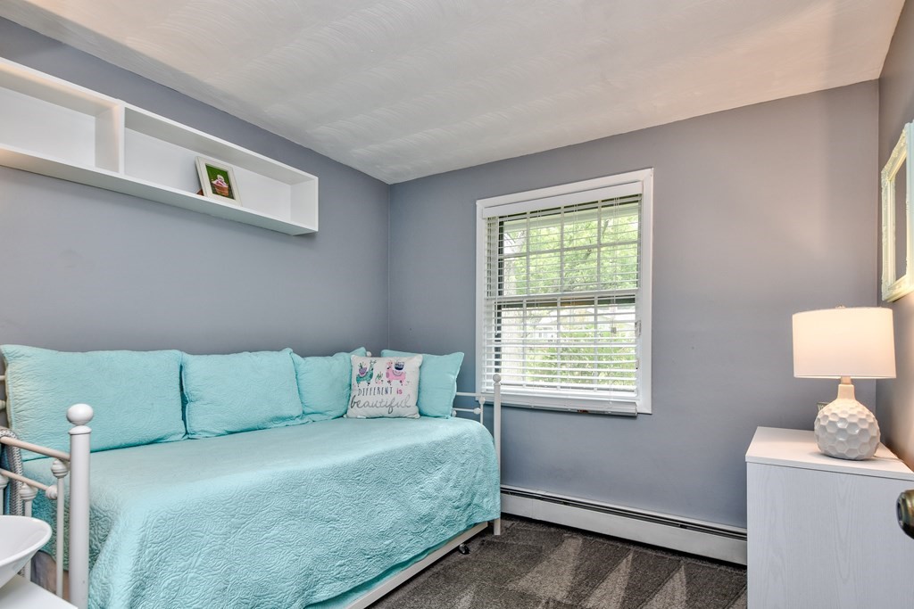 4 Catherine Road Framingham, MA 01701 - Photo 13 of 32 a bedroom with a bed and a window
