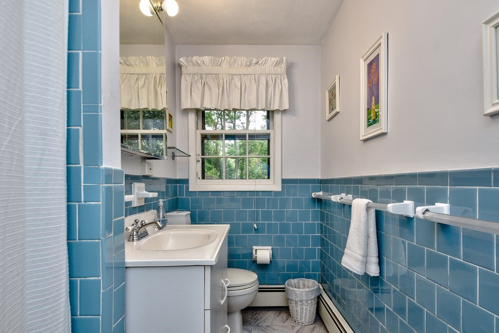 4 Catherine Road Framingham, MA 01701 - Photo 14 of 32 a bathroom with a sink toilet and shower