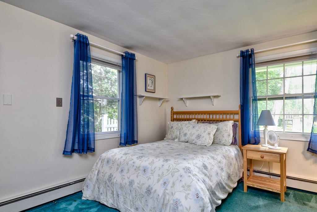 4 Catherine Road Framingham, MA 01701 - Photo 16 of 32 a bedroom with a bed and a window