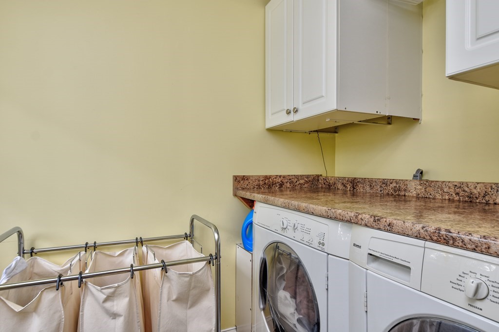 4 Catherine Road Framingham, MA 01701 - Photo 18 of 32 a utility room with dryer and washer