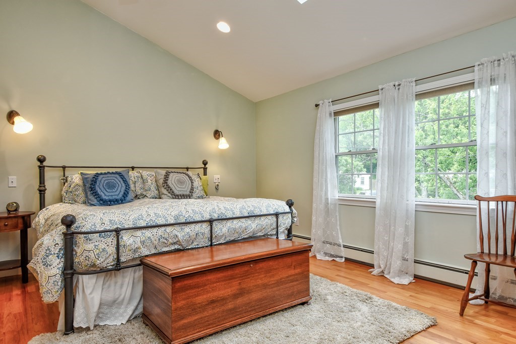 4 Catherine Road Framingham, MA 01701 - Photo 24 of 32 a bedroom with a bed and window