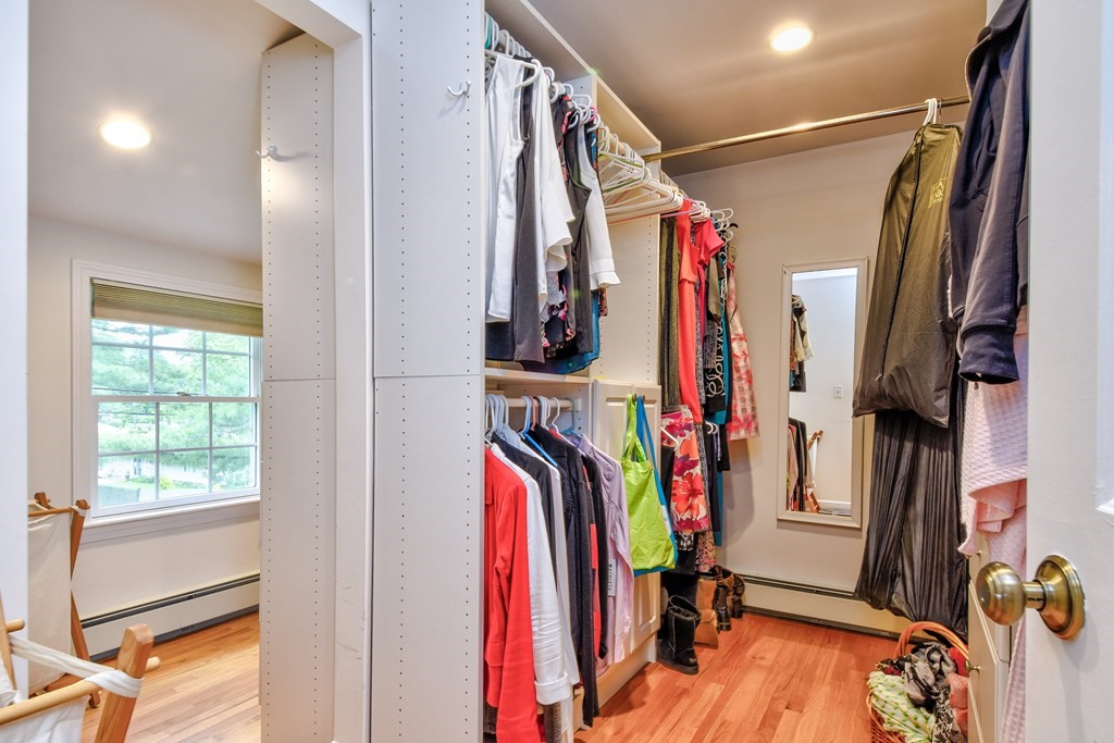 4 Catherine Road Framingham, MA 01701 - Photo 25 of 32 a view of walk in closet with clothes and shoes