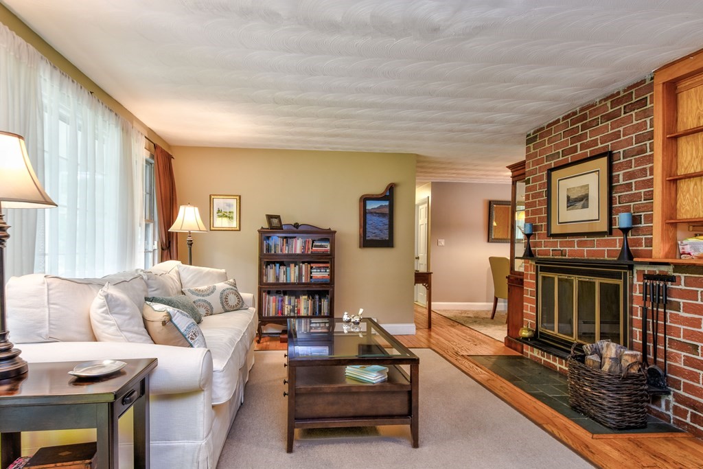 4 Catherine Road Framingham, MA 01701 - Photo 5 of 32 a living room with furniture and a fireplace
