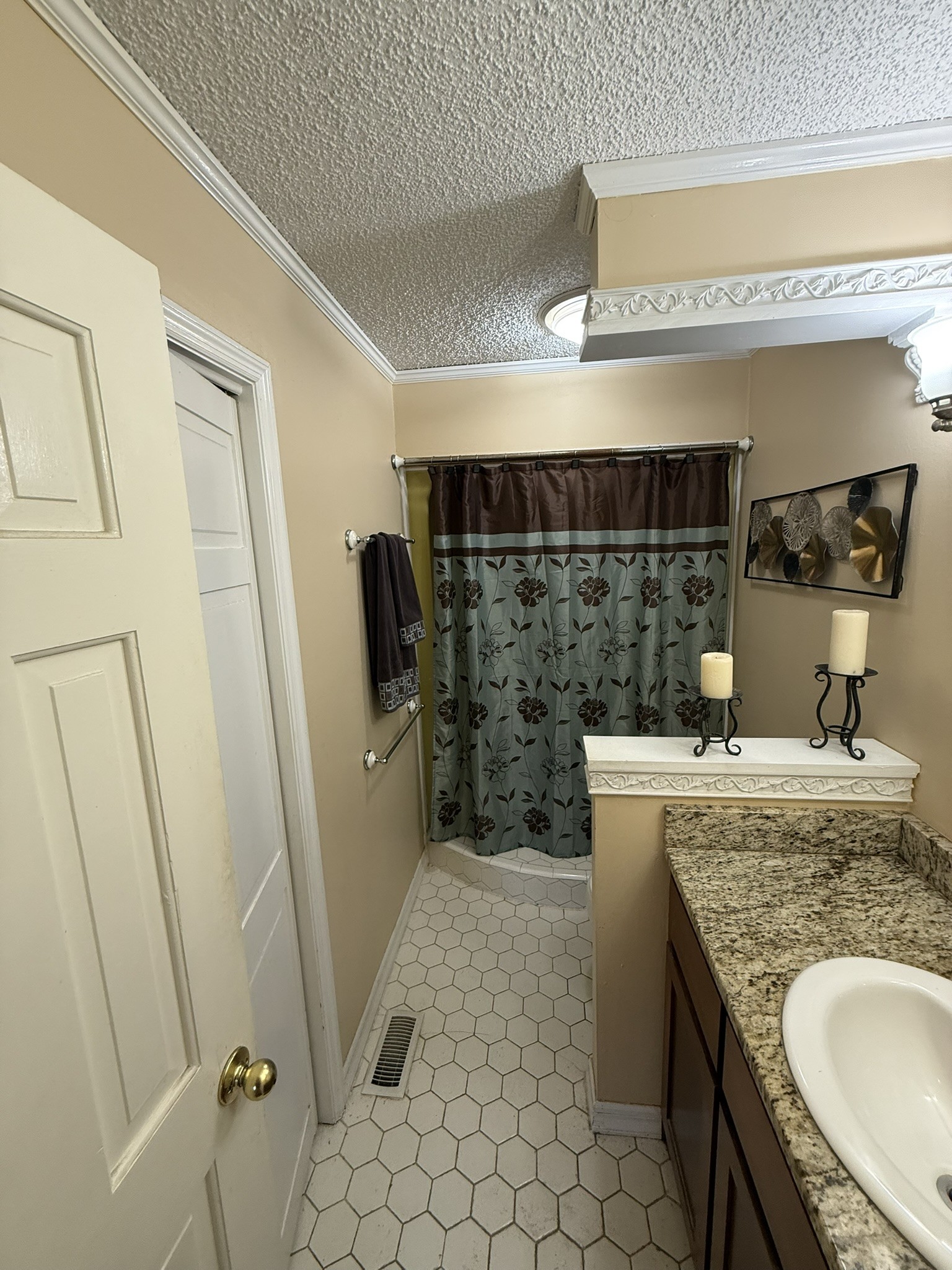 353 Golf Club Road McMinnville, TN 37110 - Photo 14 of 28 a bathroom with a granite countertop sink a toilet and shower
