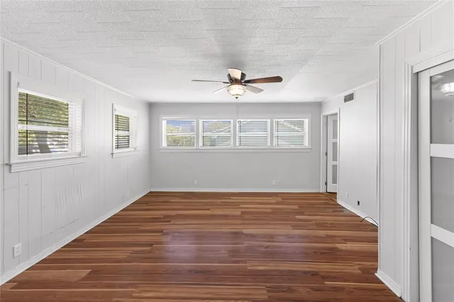a bathroom with a double vanity sink mirror and shower