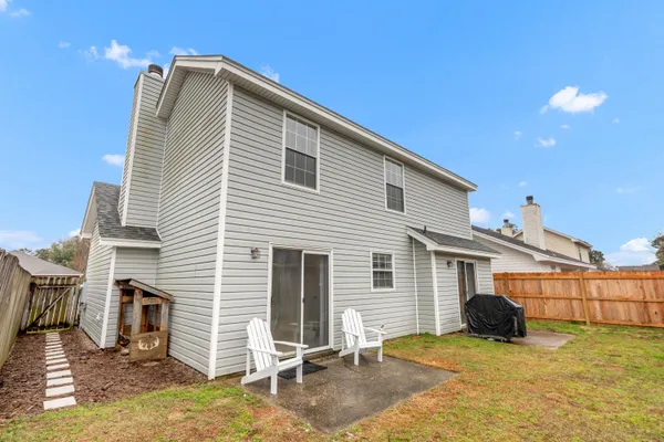 a view of a house with a patio